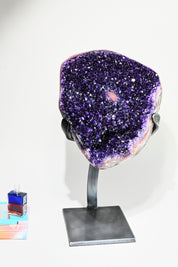 amethyst crystal geode on stand home decor