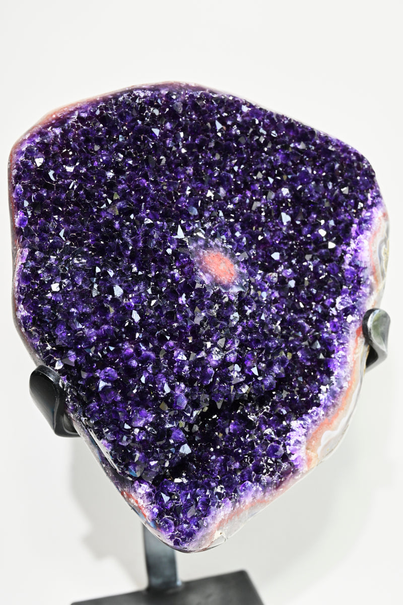 amethyst crystal geode on stand home decor