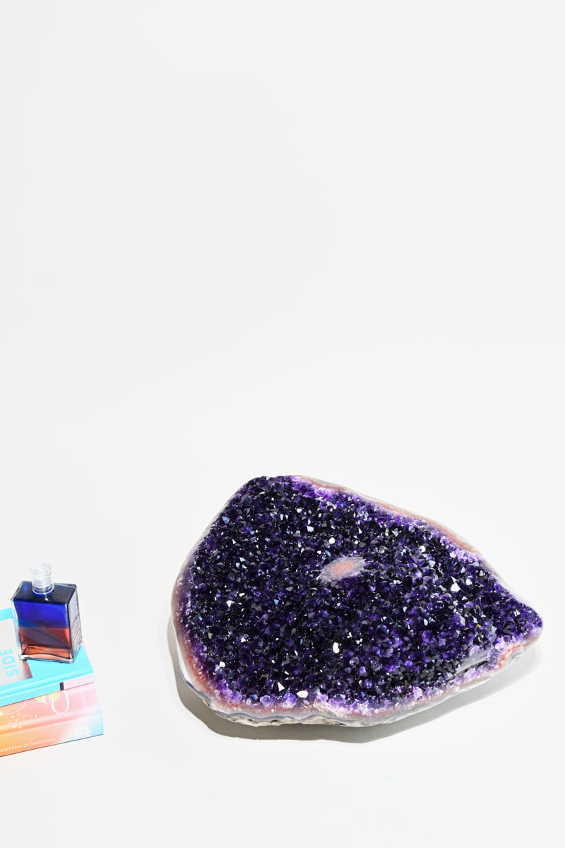 amethyst crystal geode on stand home decor