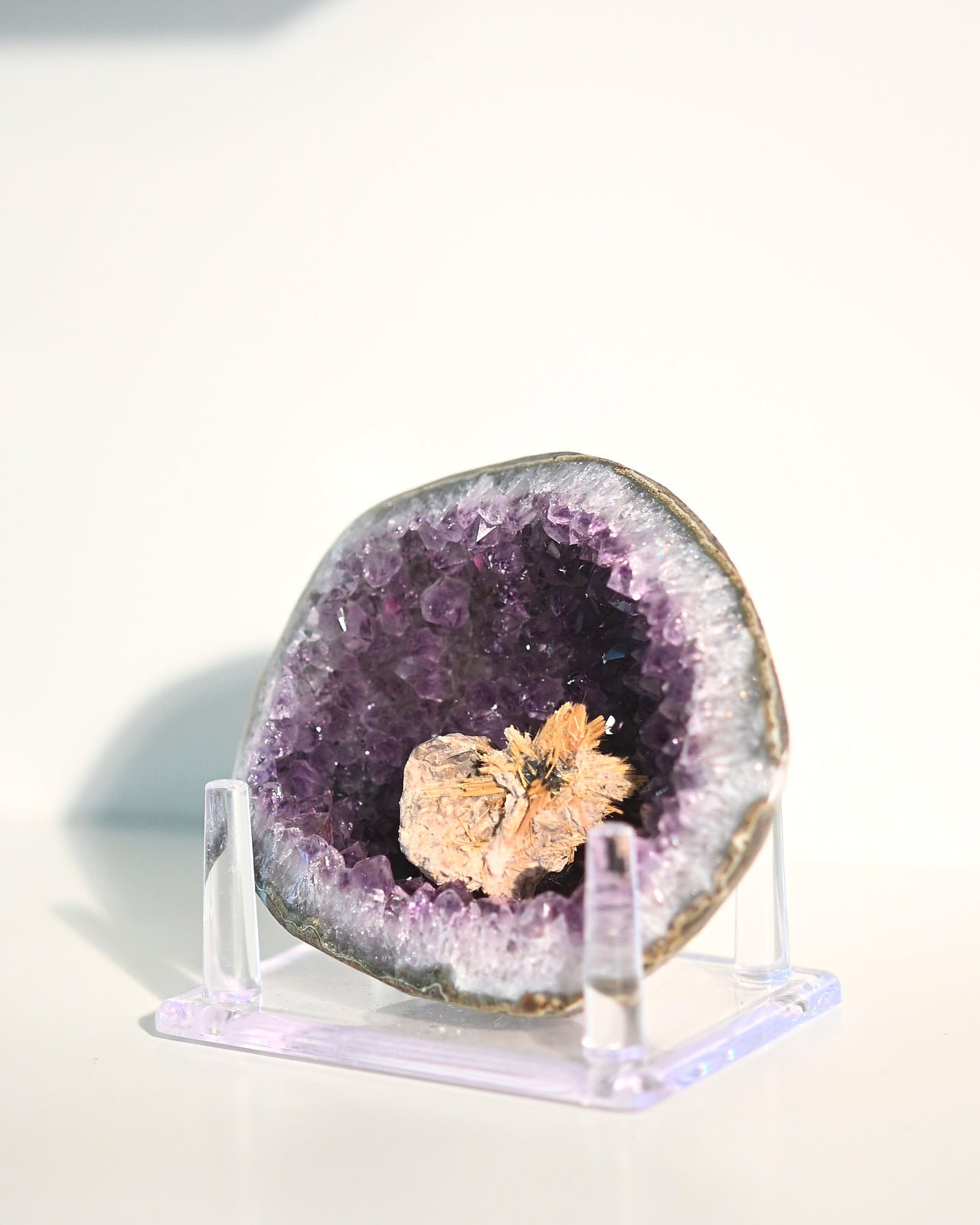 Amethyst Geode w/ Mini Golden Rutile On Stand