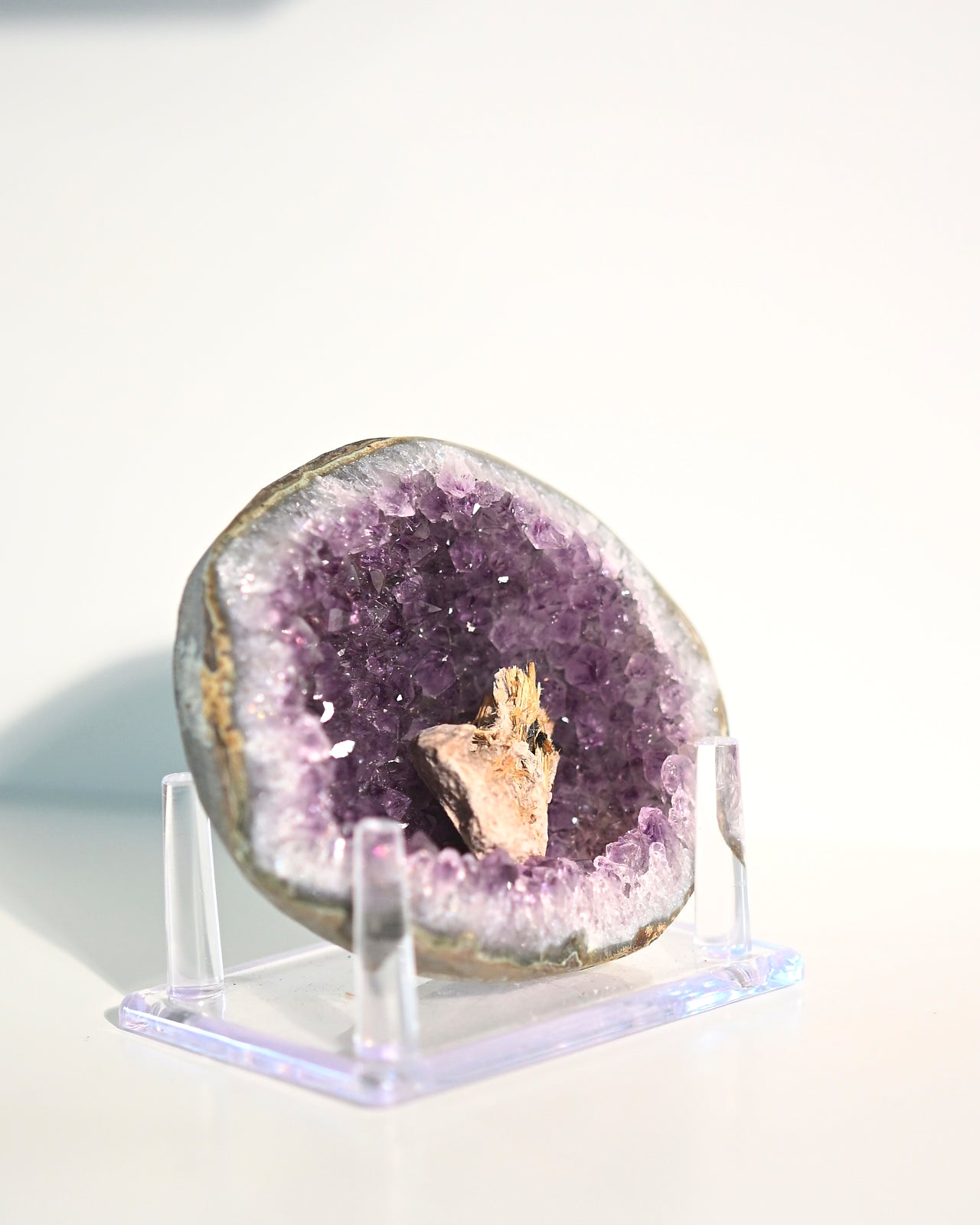 Amethyst Geode w/ Mini Golden Rutile On Stand