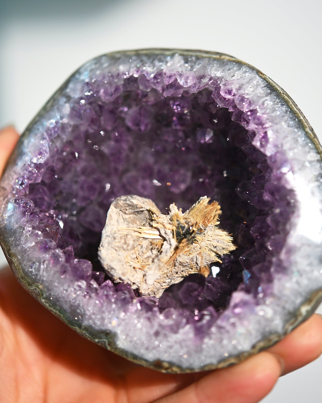 Amethyst Geode w/ Mini Golden Rutile On Stand